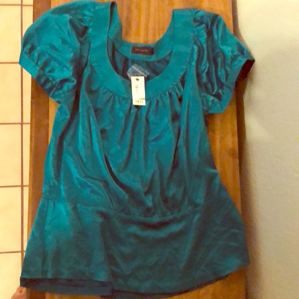 The limited dress blouse. Brand new. Excellent
